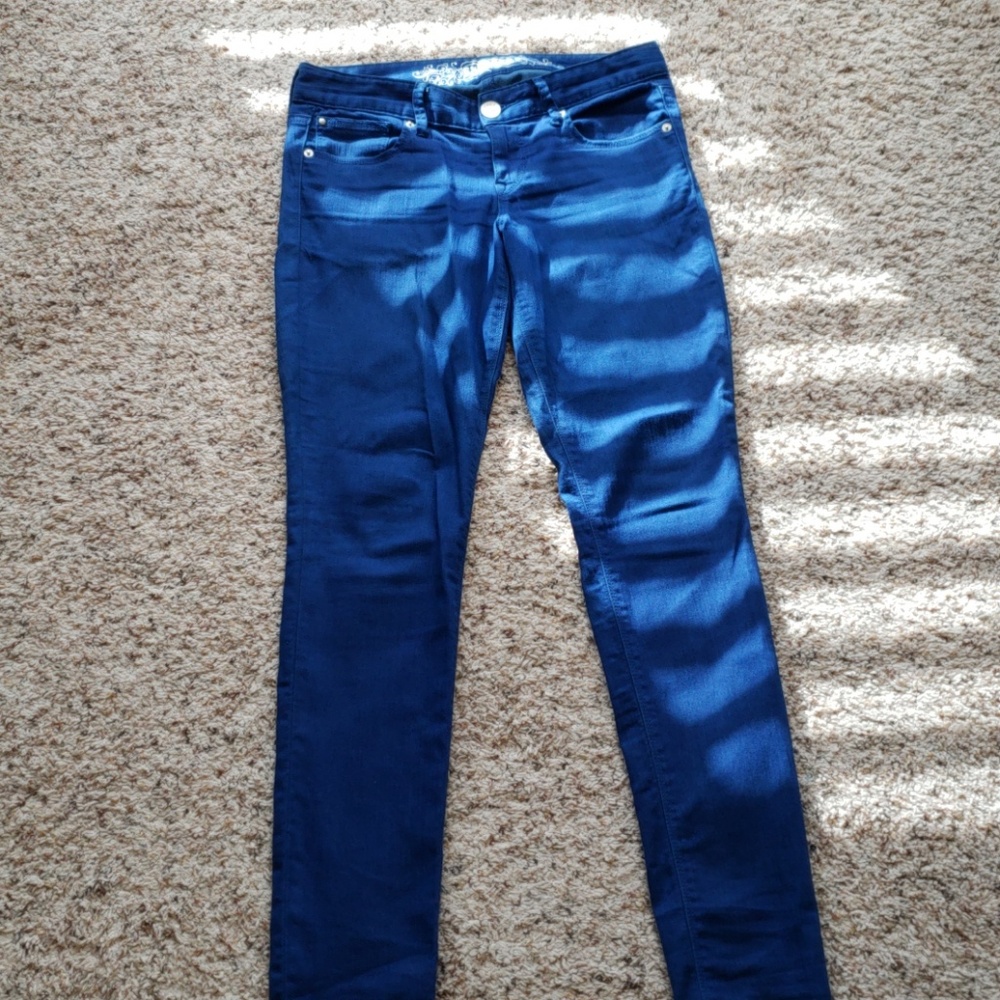 Blue low rise skinny jeans